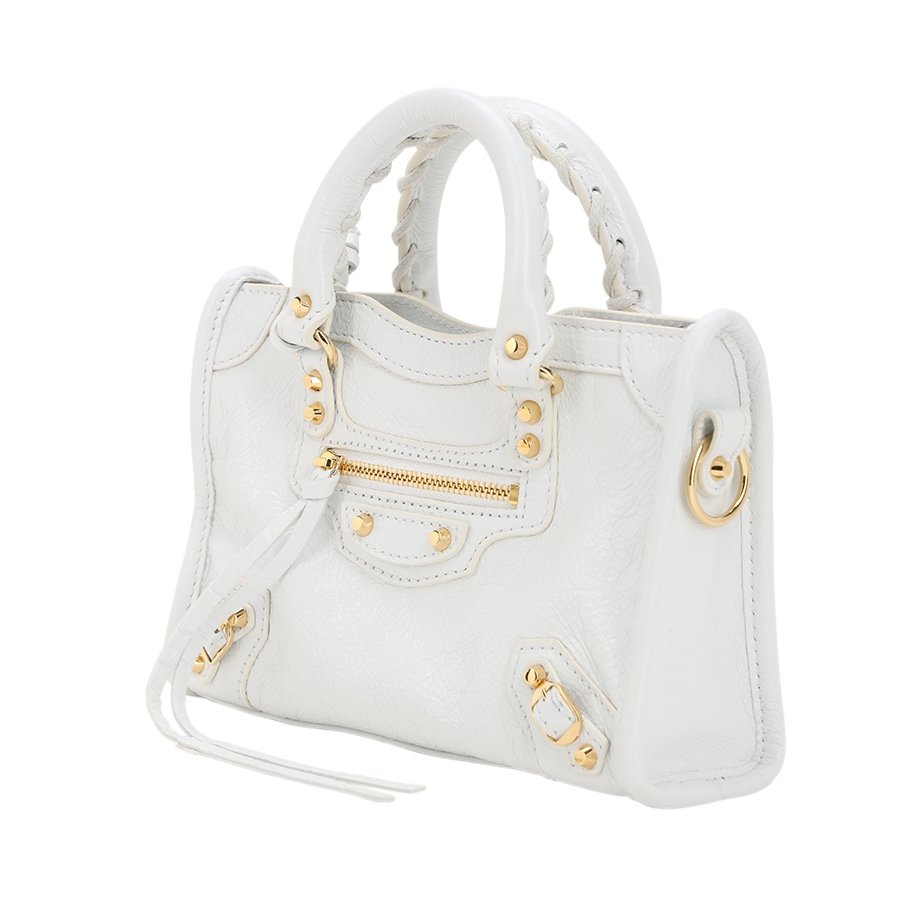 White leather handbag after background removal and retouching