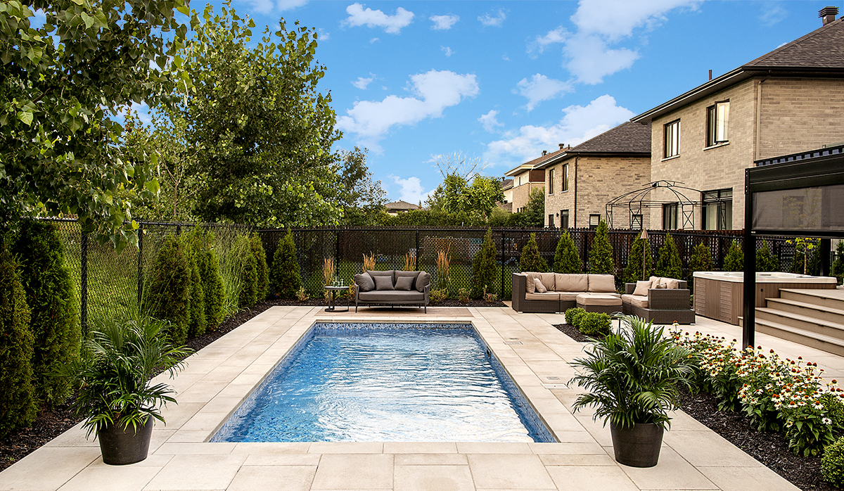 Real estate photo with sky replacement over a backyard pool